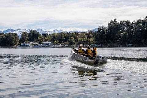 Returning across the river with Adventure Manapouri river taxi